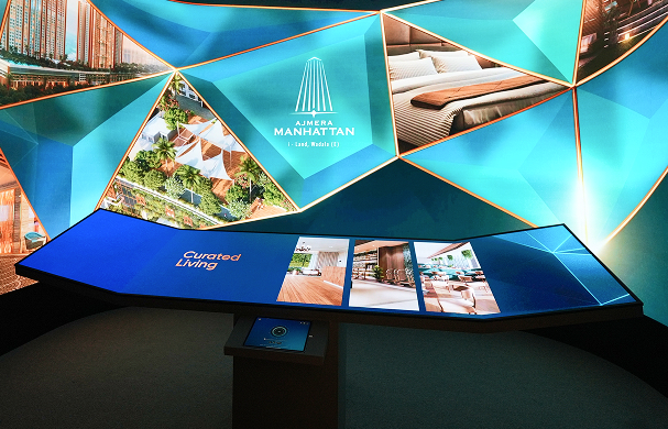 Ajmera Manhattan curved LED with interactive digital display showcasing curated living